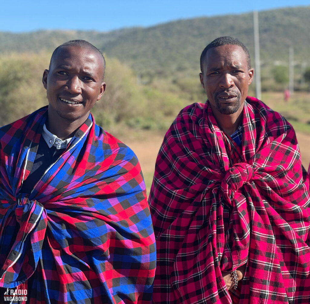 Three Maasai men wearing the distinctive shuka cloth in Kenya