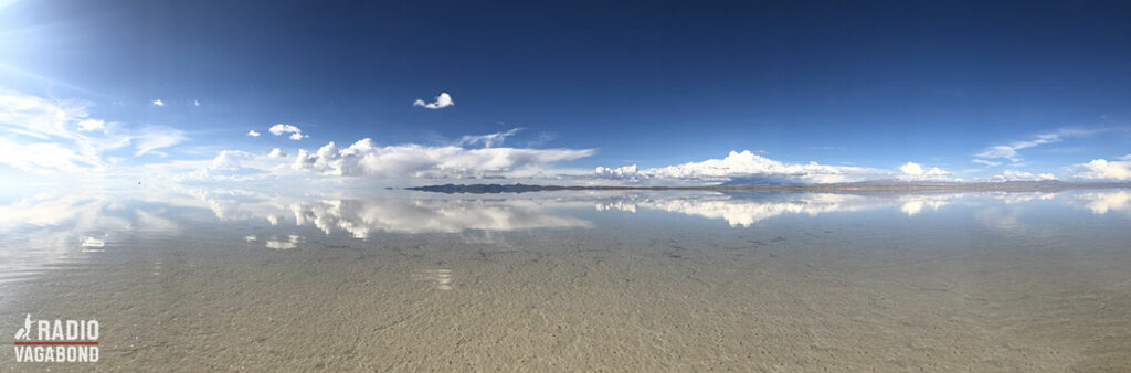 Just a few inches of water as long as the eye can see, which is completely still and creates a mirror effect.